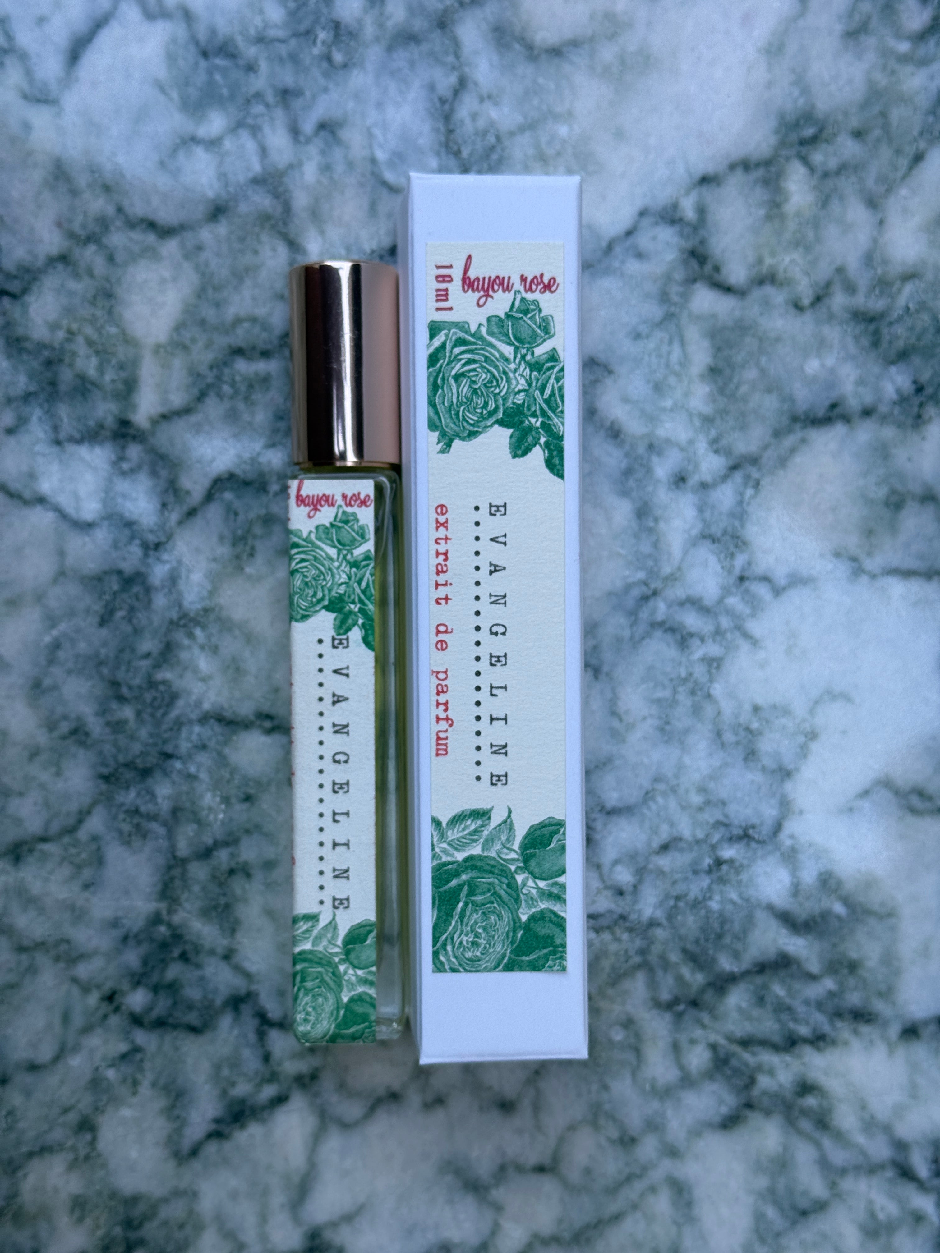 Evangeline extrait de parfum 10 ml glass bottle with gift box on marble surface