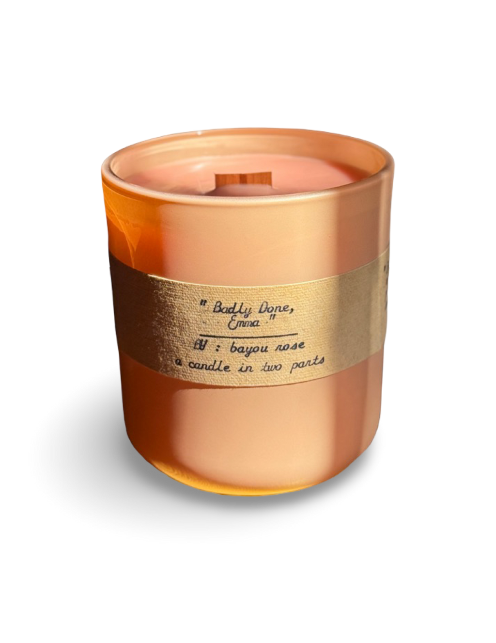 Badly Done, Emma refillable candle by Bayou Rose on white background in peach jar