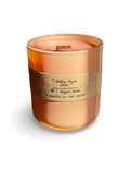 Badly Done, Emma refillable candle by Bayou Rose on white background in peach jar