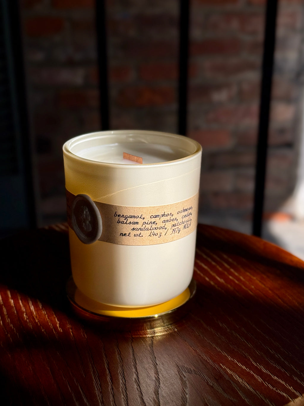 Bayou Rose Half Agony Half Hope candle — Persuasion inspired paper and ink candle on wood surface
