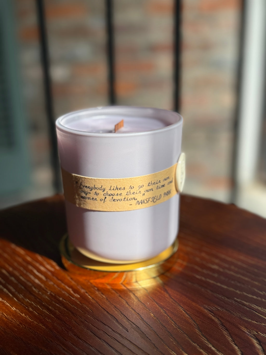 Bayou Rose Manner of Devotion candle — Mansfield Park inspired white tea and lavender candle on wood surface
